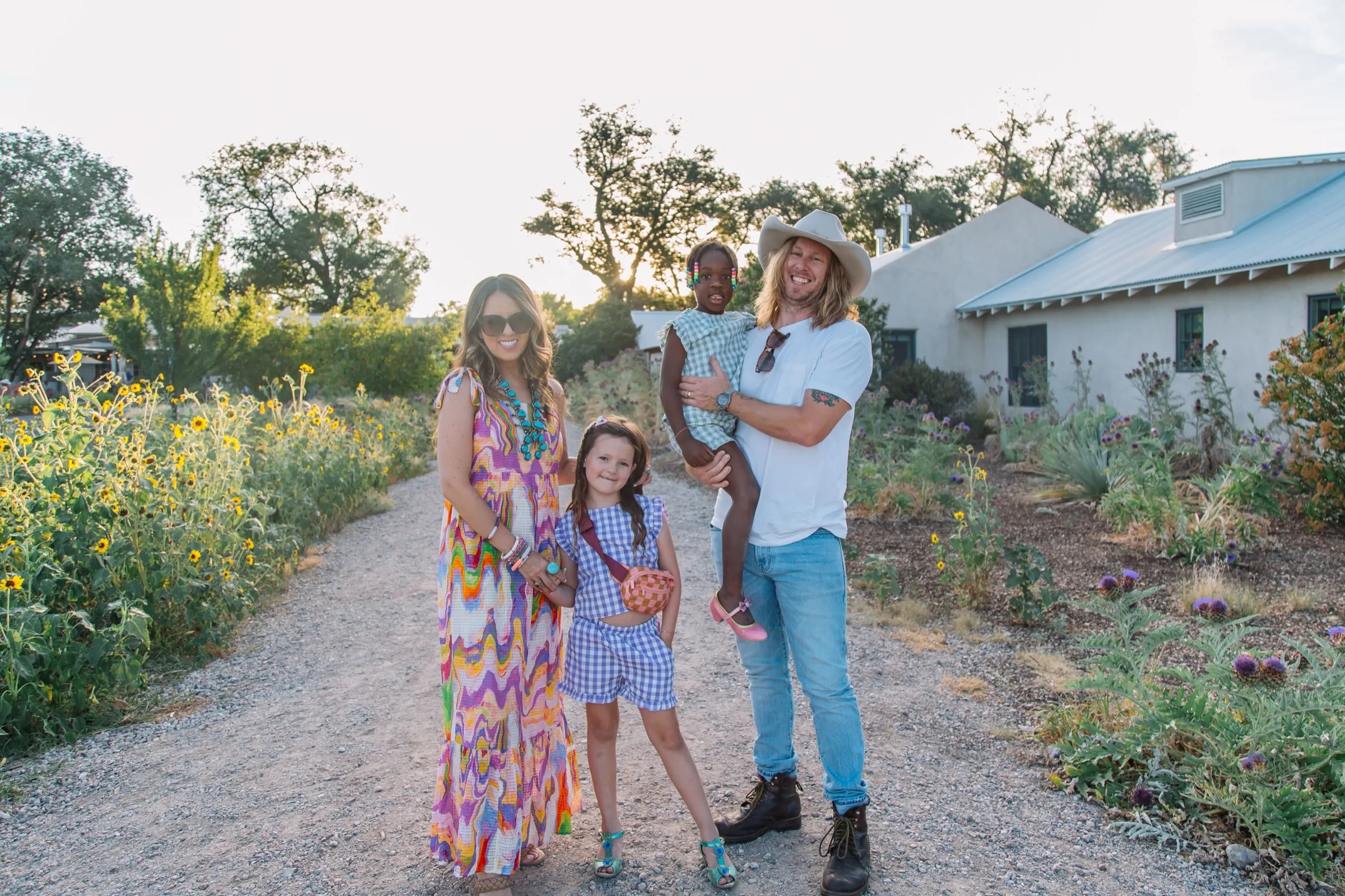 The whole Ice family on the golden wildflower drive at their Santa Fe casa