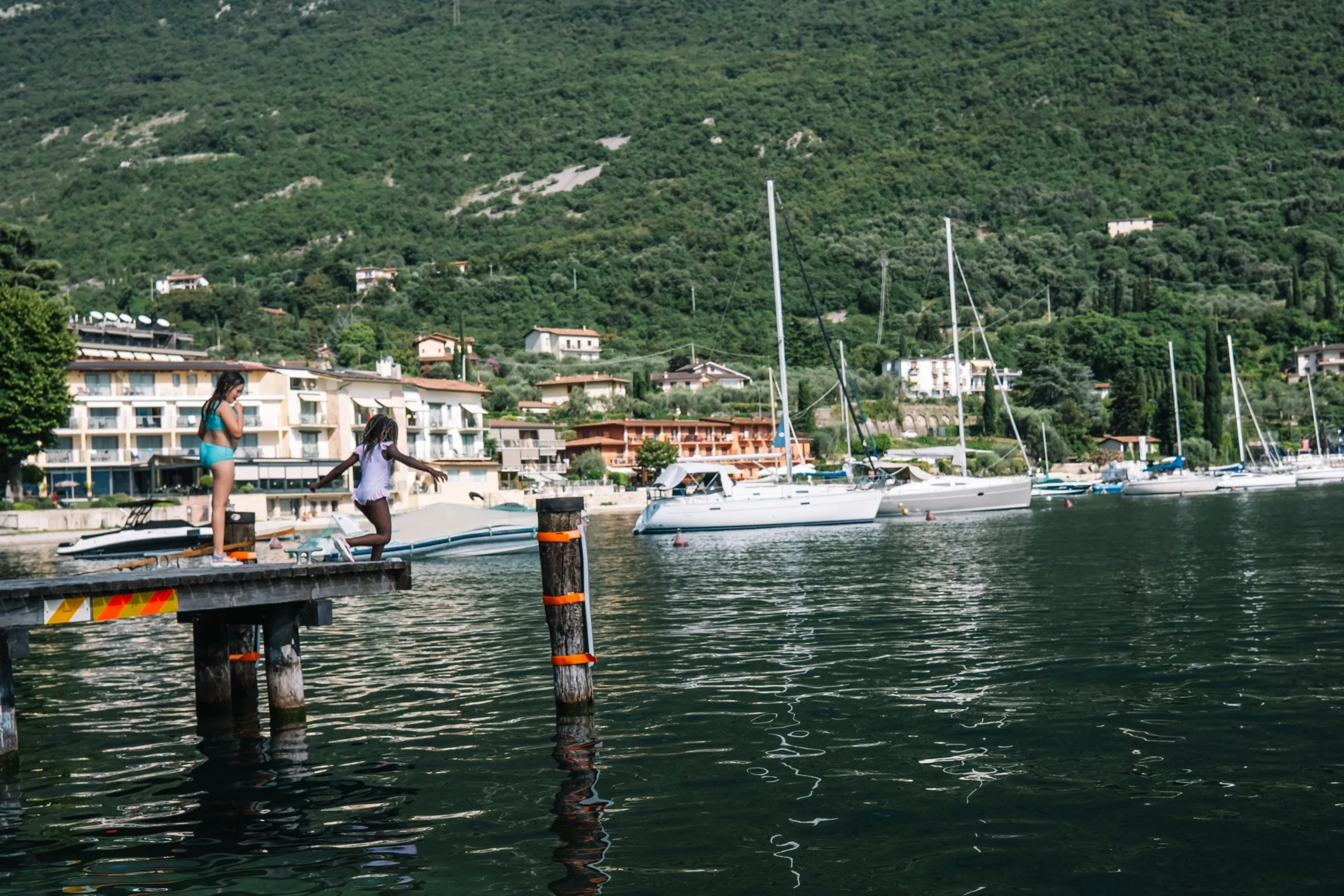 Sailboats on Lake Garda at golden hour